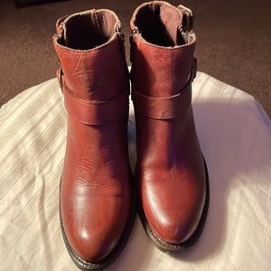 A brown pair of dingo size 8 1/2 booties excellent condition